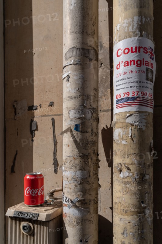 Paris, Coca Cola can laid on the ground