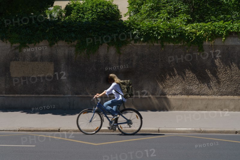 Pars, woman riding a bicycle