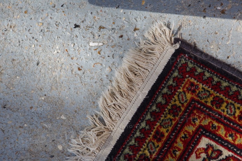 Carpet on concrete floor