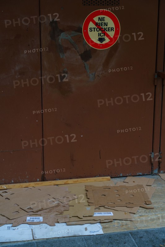 Paris, cardboard boxes in front of a garage door
