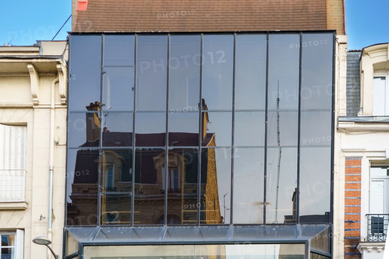 Reims, reflection in a building facade