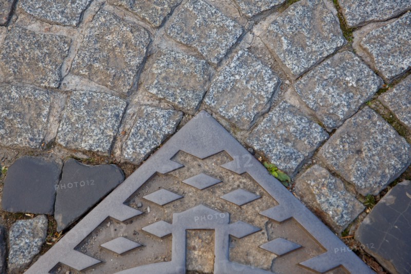 Paving stones and manhole covers