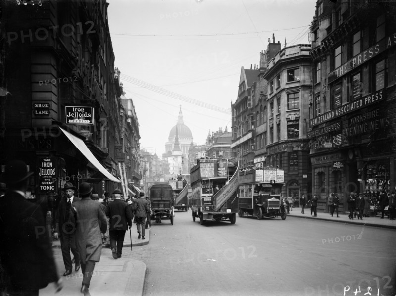 Open-topped omnibuses in Fleet Street, London Artist