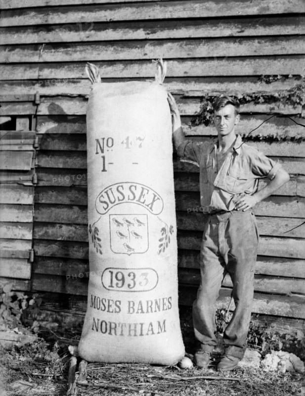 Man with hop sack at Great Dixter, East Sussex, 1933