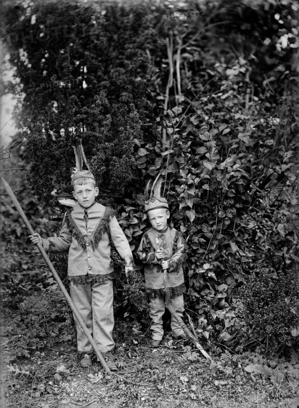 Two boys dressed as American Indians, c1896-c1920
