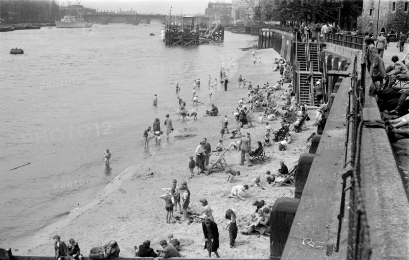 Families on Tower Beach, London, c1945-c1955