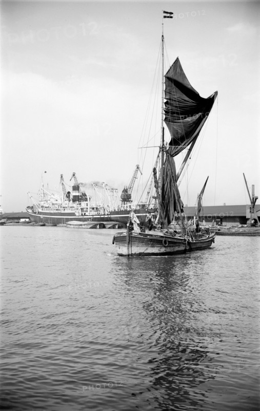A Thames sailing barge in the Royal Albert Dock, Canning Town, London, c1945-c1965