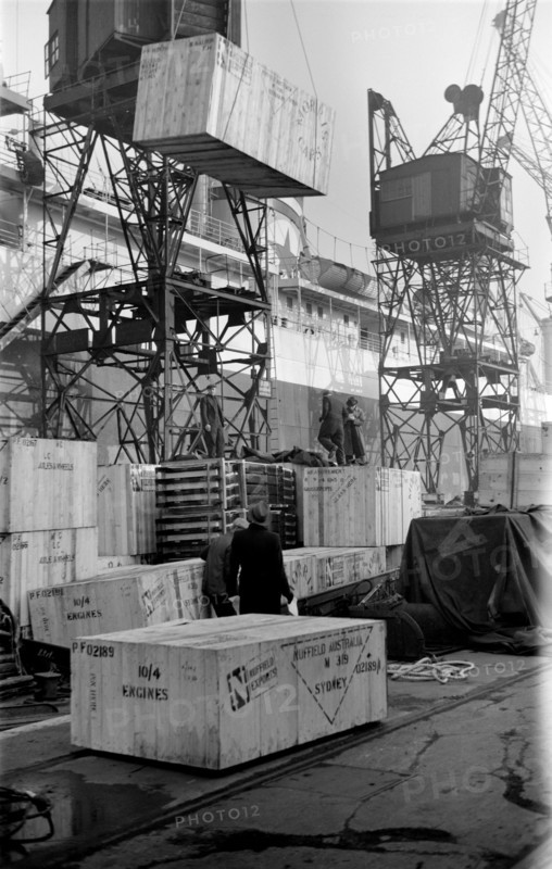 Cased car parts bound for Australia being loaded, King George V Dock, London, c1945-c1965