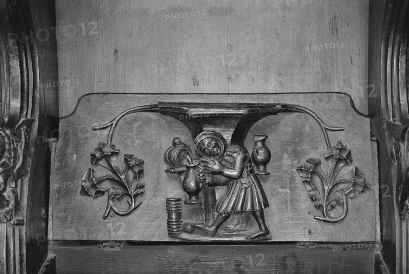 The Tapster', a misericord in St Laurence's church, Ludlow, Shropshire, 1966