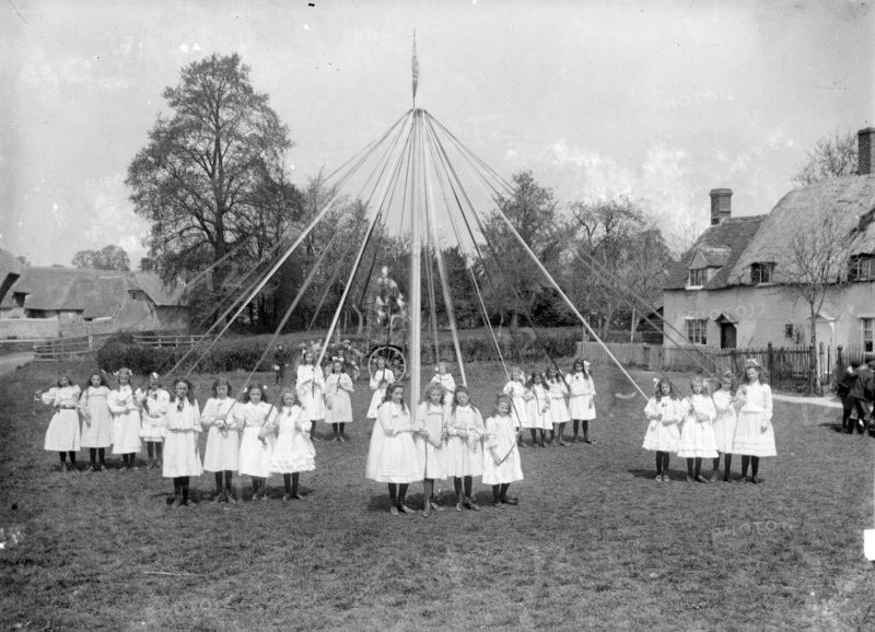 Village children taking part in the maypole dance at East Hanney, Oxfordshire, c1860-c1922