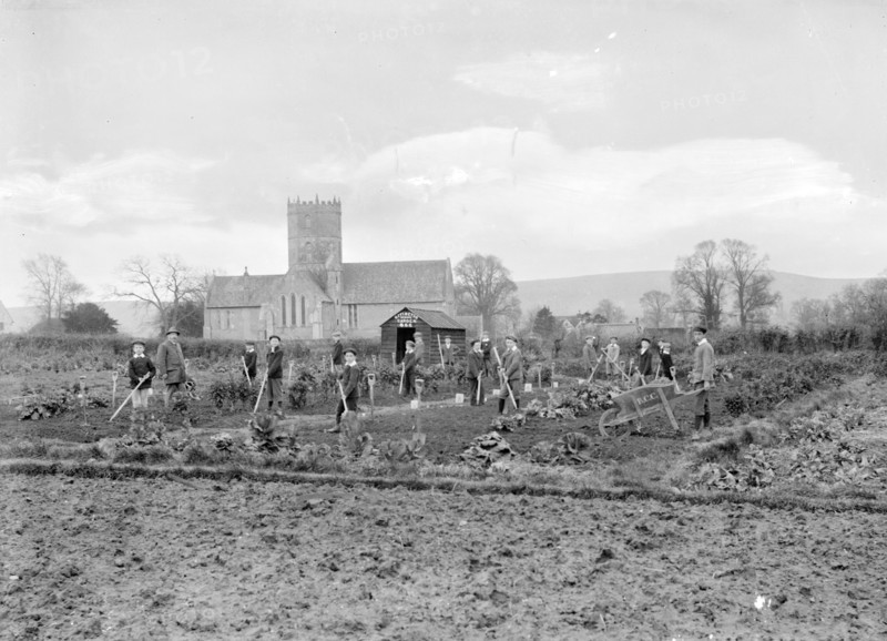 Schoolboys working in the school garden supervised by a teacher, Uffington, Oxfordshire, 1916