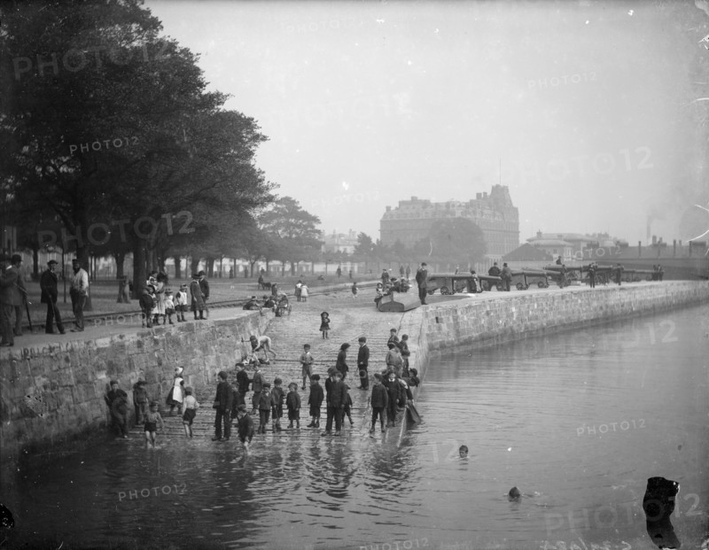 Children play ducks and drakes in the River Itchen, Southampton, Hampshire, c1878