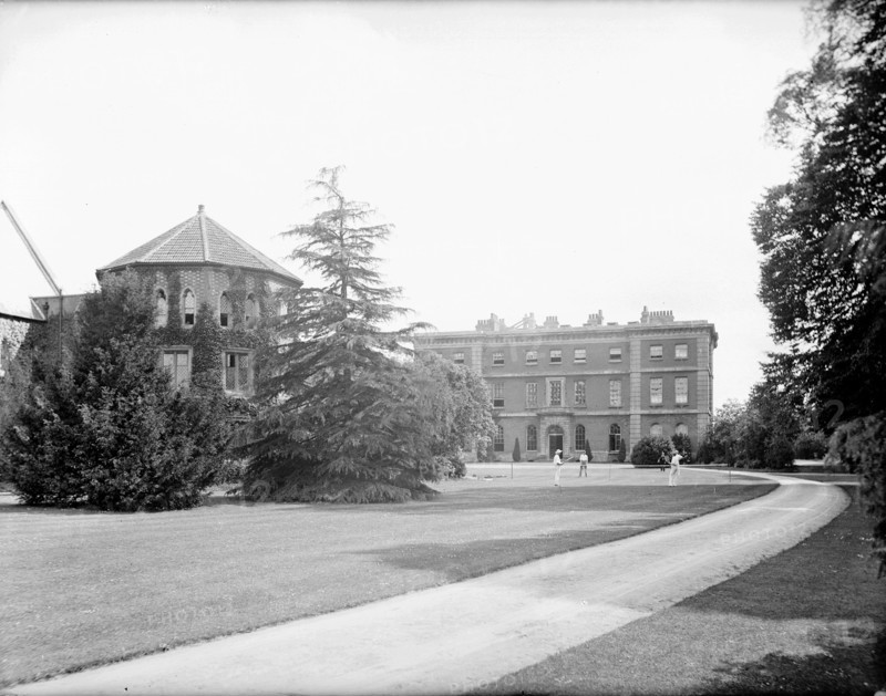 Students playing tennis on the lawn, Radley College, Radley, Oxfordshire, c1860-c1922