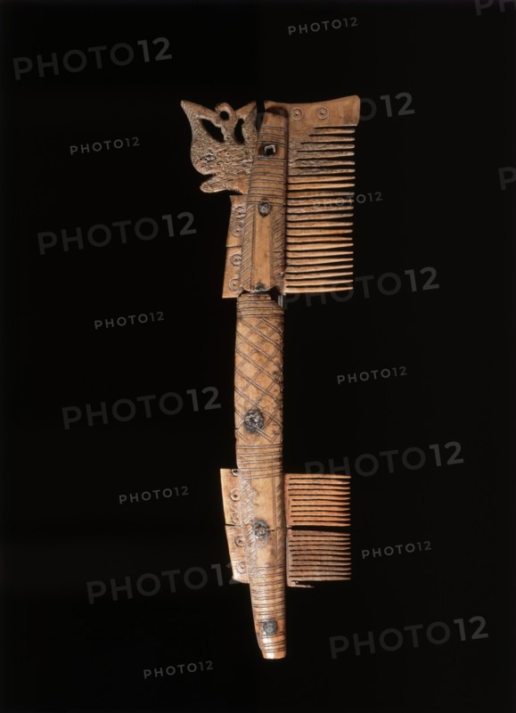 Bone comb. Artist: Unknown