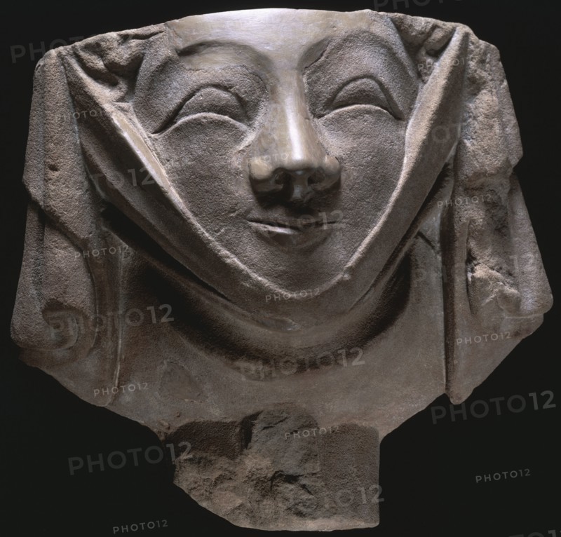 Stone corbel in the shape of a smiling nun, medieval, 14th century. Artist: Unknown