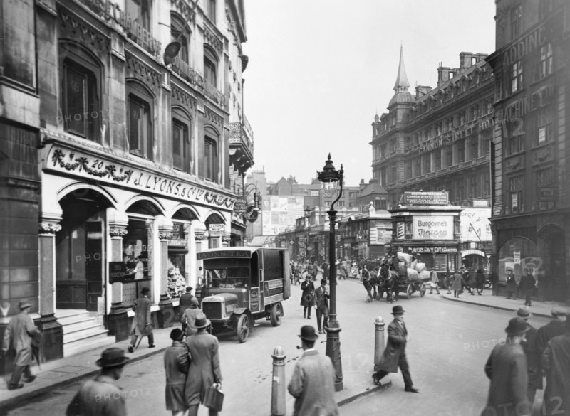 Cannon Street with Lyons shop, hotel and station, London, c1920-c1930.  Artist: George Davison Reid