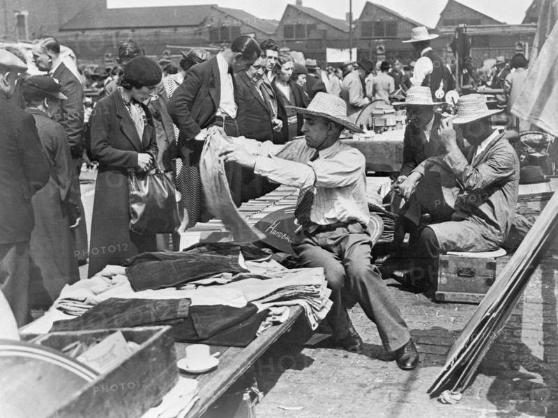 A market stall in Caledonian Market, Islington, London, 1930s. Artist: John H Stone
