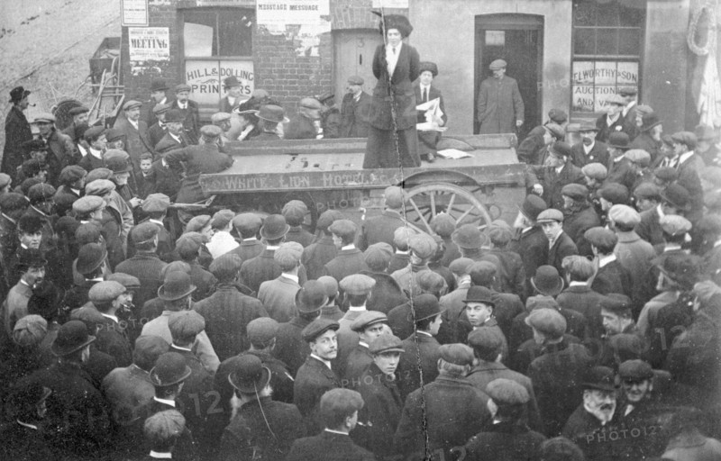 Isabel Seymour addressing a crowd of men and boys from a tradesman's cart, 1908. Artist: Unknown