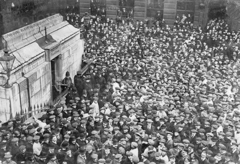 Onlookers gather at the Monument, London, captured by two suffragettes on 18th April 1913. Artist: Unknown