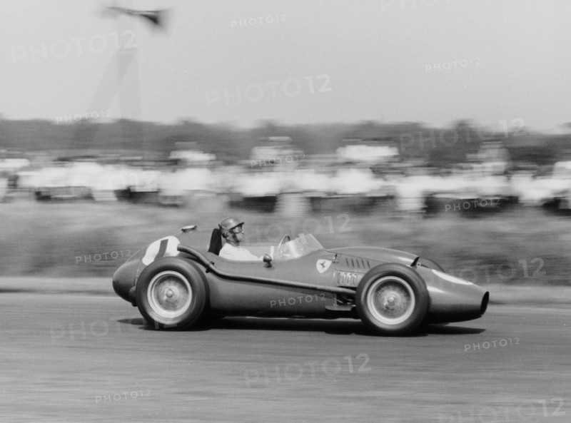 Peter Collins in a Ferrari Dino, British Grand Prix, Silverstone, 1958. Artist: Unknown