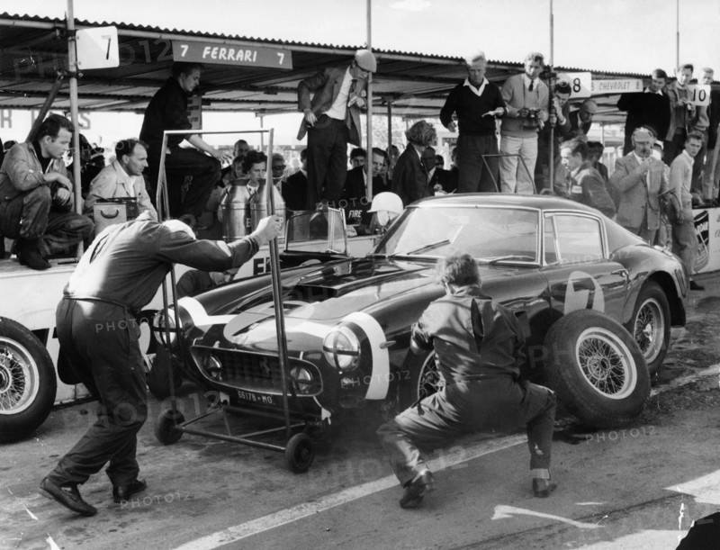 Stirling Moss in a Ferrari, Goodwood, 1961. Artist: Unknown