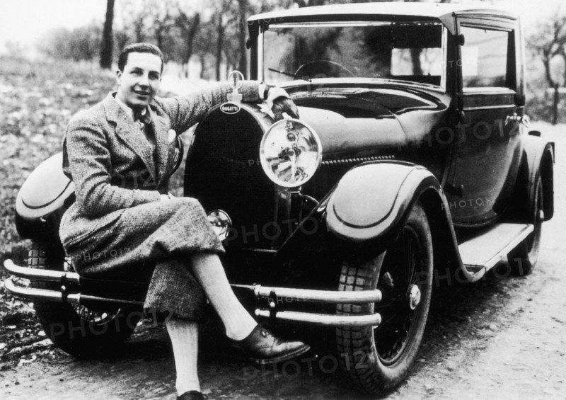 Jean Bugatti pictured with a Bugatti car, 1930s. Artist: Unknown