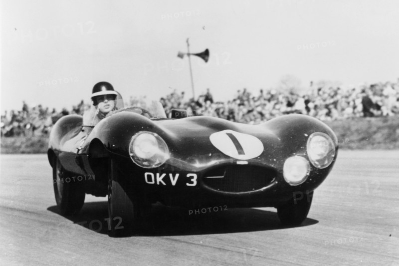 Mike Hawthorn driving a D Type Jaguar, c1955-c1956. Artist: Unknown