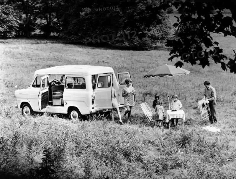Family group with a 1968 Ford Explorer Camper van, (1968?). Artist: Unknown