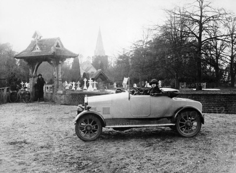 1922 11.9 hp Calcott outside a church, (c1922?). Artist: Unknown