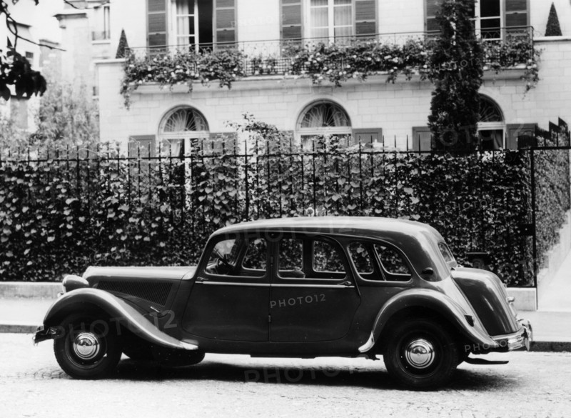 1954 Citroën 15CV Familiale parked outside a house. Artist: Unknown