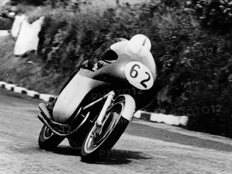 John Surtees racing an MV Agusta, 1958. Artist: Unknown
