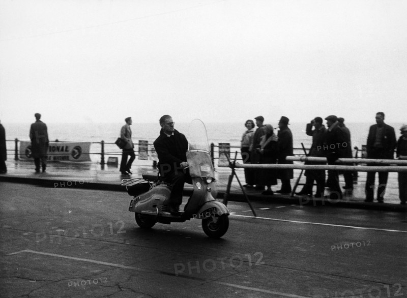 A man on a Lambretta scooter, taking part in the Daily Express rally, 1953. Artist: Unknown
