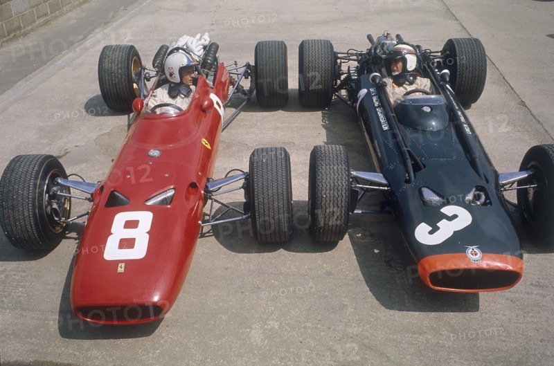 Chris Amon and Jackie Stewart at the British Grand Prix, Silverstone, Northamptonshire, 1967. Artist: Unknown