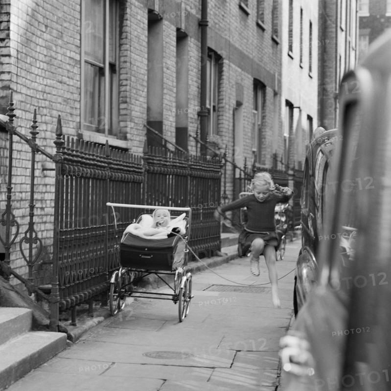 Girl skipping, London, 1960-1965