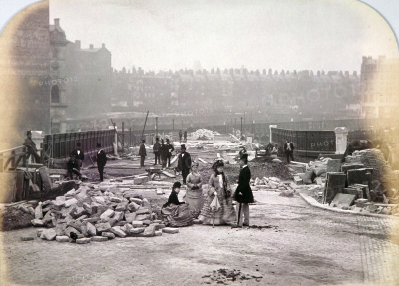 View of figures on Holborn Viaduct during its construction, City of London, 1870. Artist: Henry Dixon