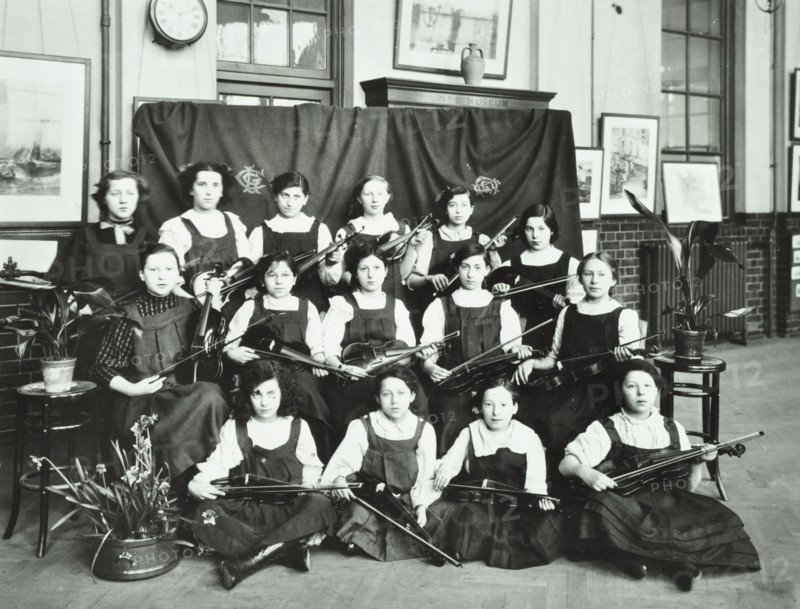 Girls swimming championship team with their shield, Tollington Park Central School, London, 1915. Artist: Unknown.