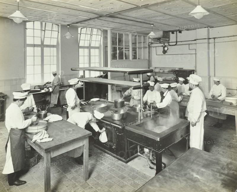 Male cookery students at work in the kitchen, Westminster Technical Institute, London, 1910. Artist: Unknown.