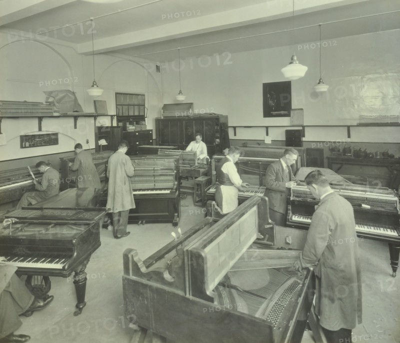 Piano repairing class, Northern Polytechnic, London, 1930. Artist: Unknown.