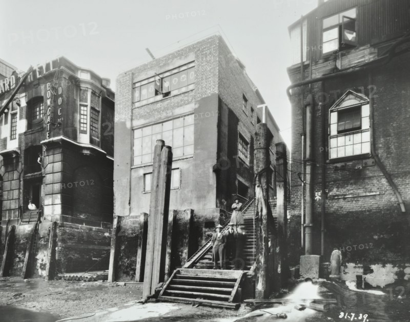 Steps down to the river, Dowgate Dock, Upper Thames Street, City of London, 1939. Artist: Unknown.