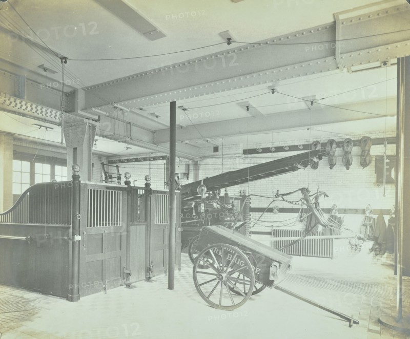 Interior of appliance room, Northcote Road Fire Station, Battersea, London, 1906. Artist: Unknown.