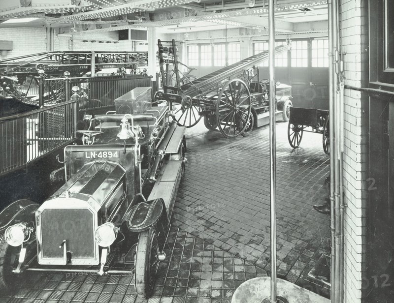 Fire engines and equipment at Cannon Street Fire Station, City of London, 1913. Artist: Unknown.