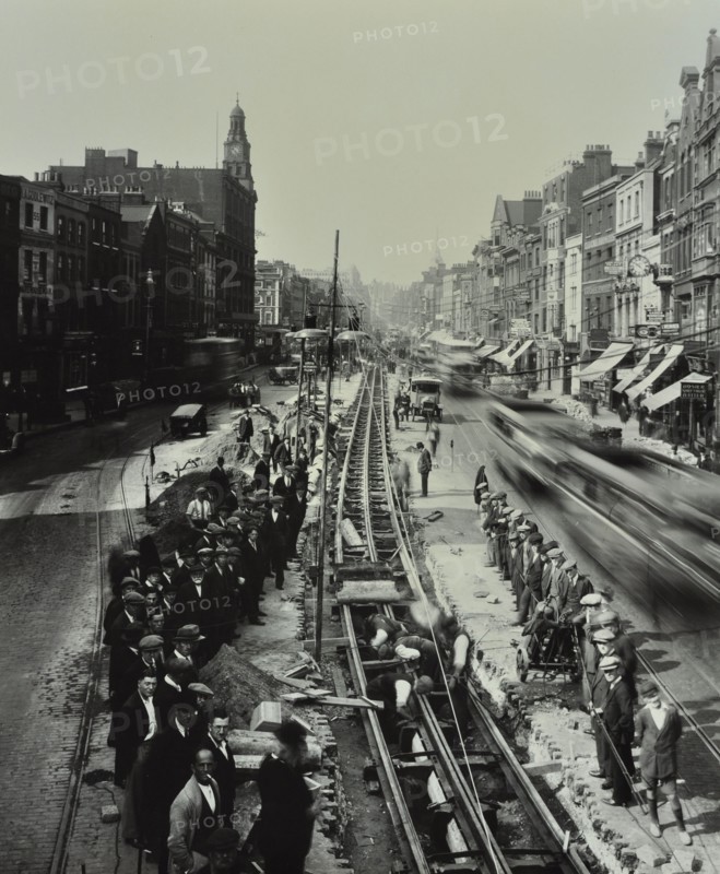 Tramline being laid in the middle of the road, Whitechapel High Street, London, 1929. Artist: Unknown.