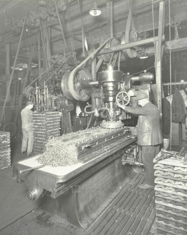 Man using a miller and planer, Charlton Central Repair Depot, London, 1932. Artist: Unknown.