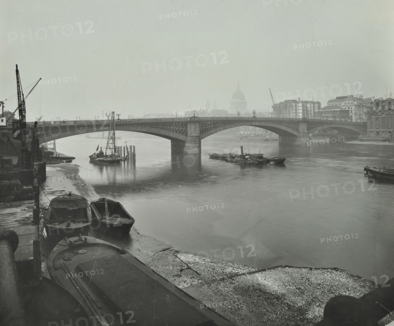 Barges at Bankside, looking upstream towards Southwark Bridge, London, 1913. Artist: Unknown.