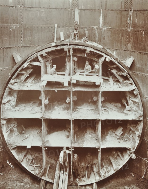 Men standing in the cutting shield, Rotherhithe Tunnel, Stepney, London, August 1907. Artist: Unknown.