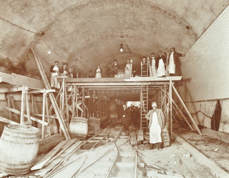 Workmen tiling the Rotherhithe Tunnel, London, December 1907. Artist: Unknown.