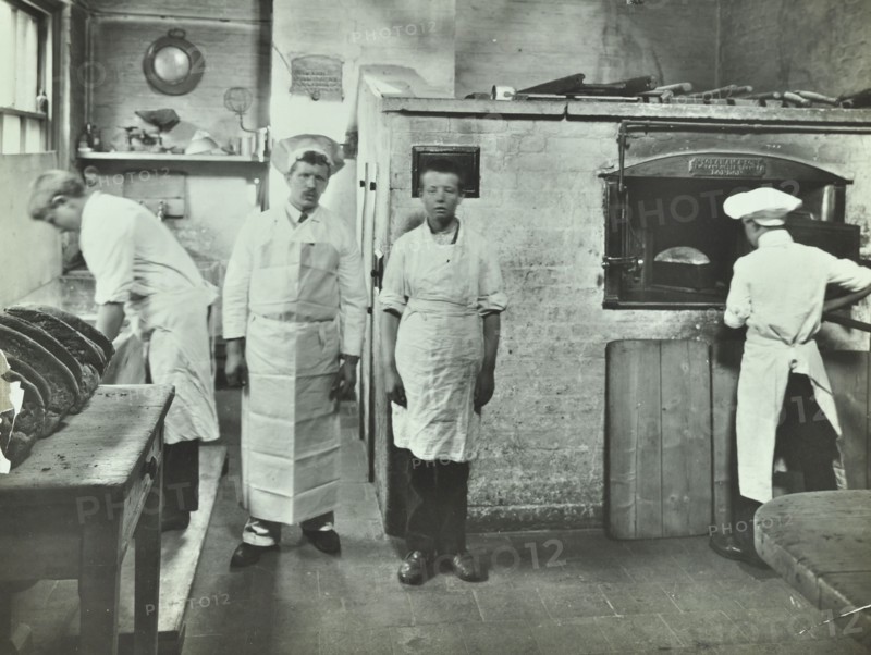 Boys making bread at Upton House Truant School, Hackney, London, 1908. Artist: Unknown.