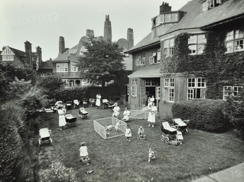 Children and carers in a garden, Hampstead, London, 1960. Artist: Unknown.