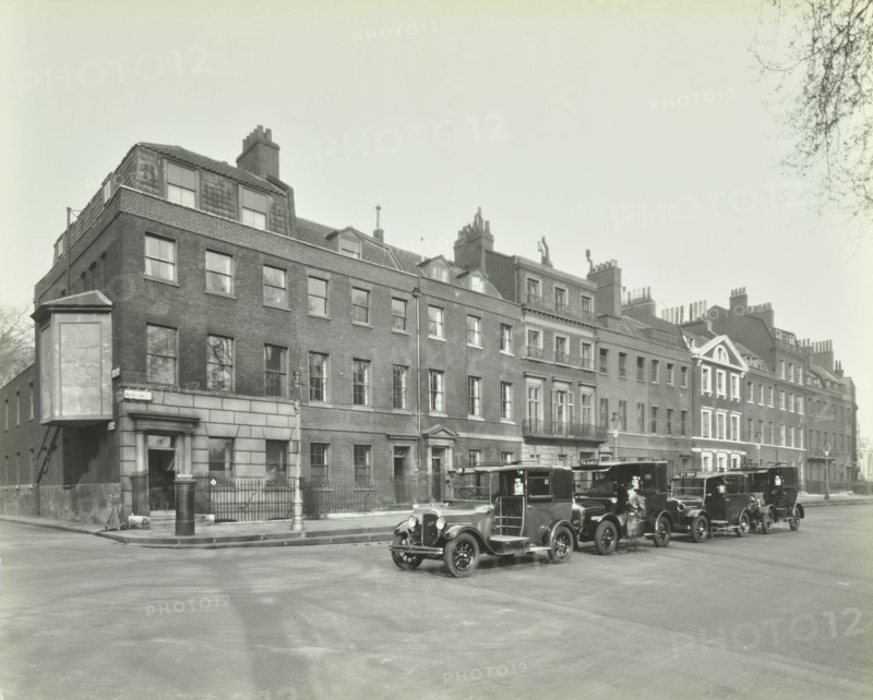 Line of taxis, Abingdon Street, Westminster, London, 1933. Artist: Unknown.