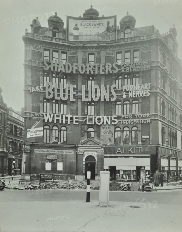 Advertisements at Cambridge Circus, Westminster, London, 1945. Artist: Unknown.